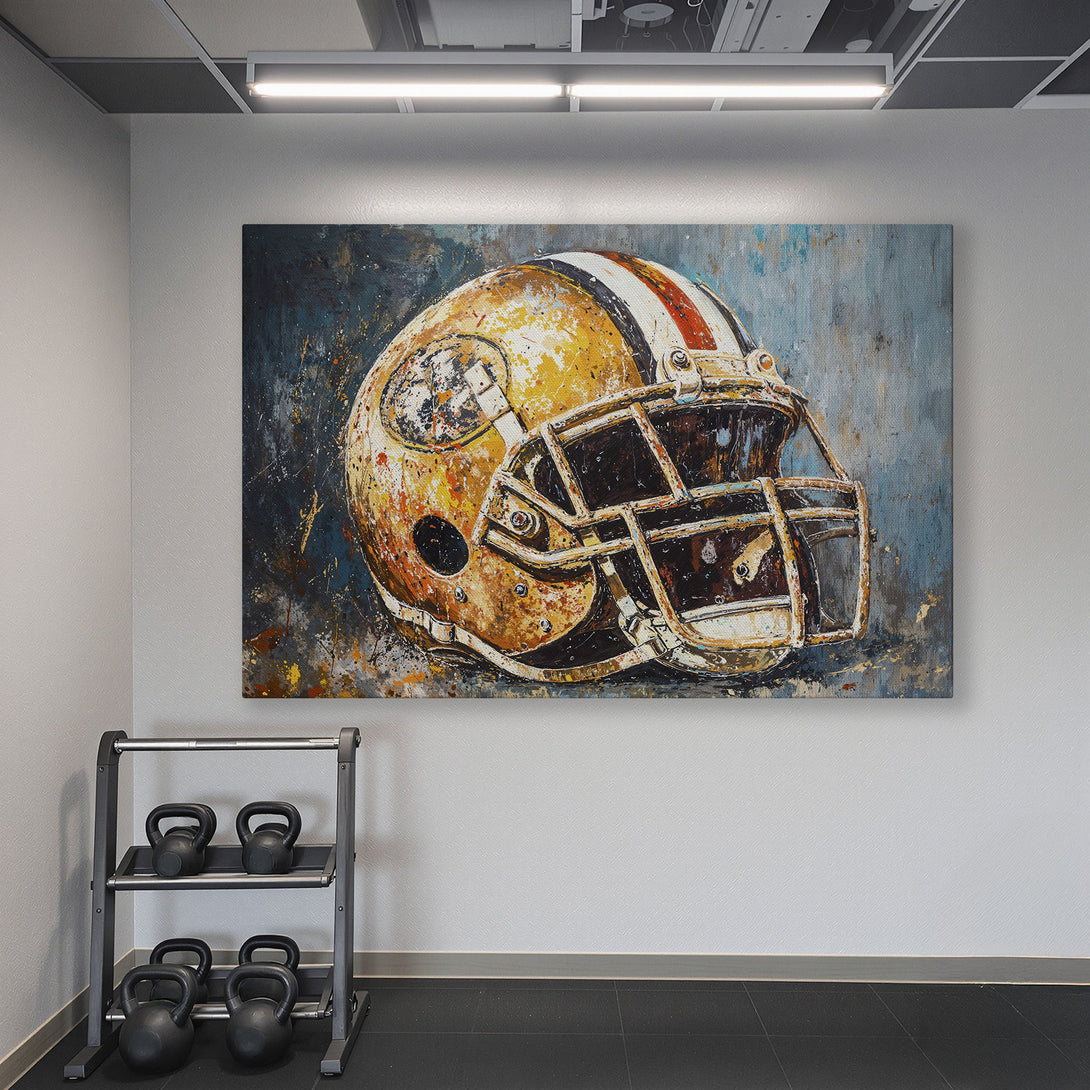 Framed Wall Art of a football helmet in a modern, abstract style with gold, red, and blue hues. Perfect for a home gym or sports-themed decor.