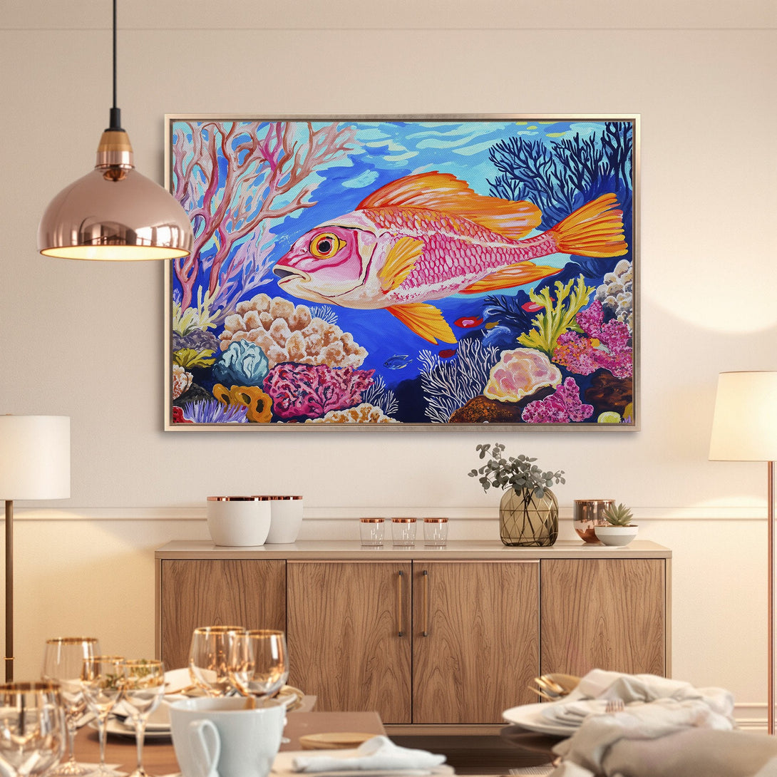 Framed Wall Art: Vibrant fish painting in a colorful coral reef scene. Adds a pop of color with a blue, pink, and orange palette to any space.