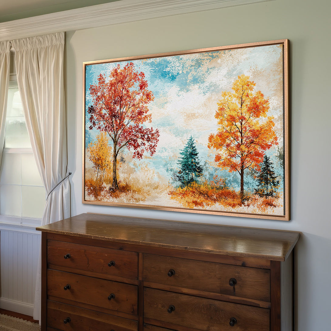 Framed Wall Art: Autumn landscape Canvas Print with vibrant red, orange, and blue hues. Adds warmth and style to any interior space.