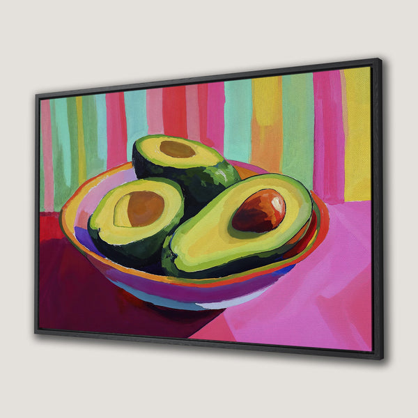Framed Wall Art: Vibrant avocado painting with a colorful, modern style. Bright pinks, greens, and yellows create a cheerful kitchen or dining room accent.