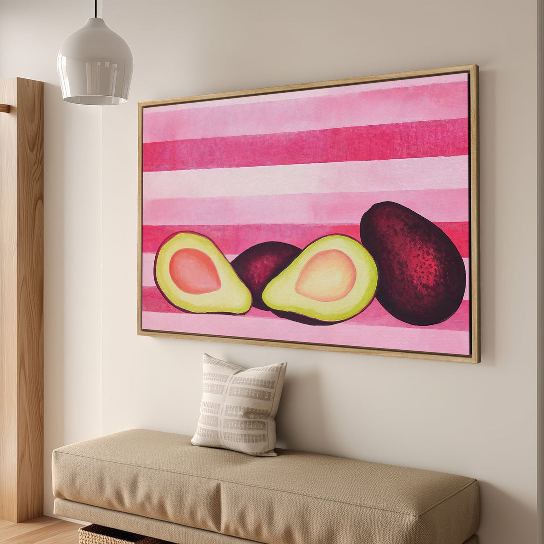 Framed Wall Art: Vibrant avocado painting with pink striped background. Modern style, pink & green color palette. Perfect kitchen decor.