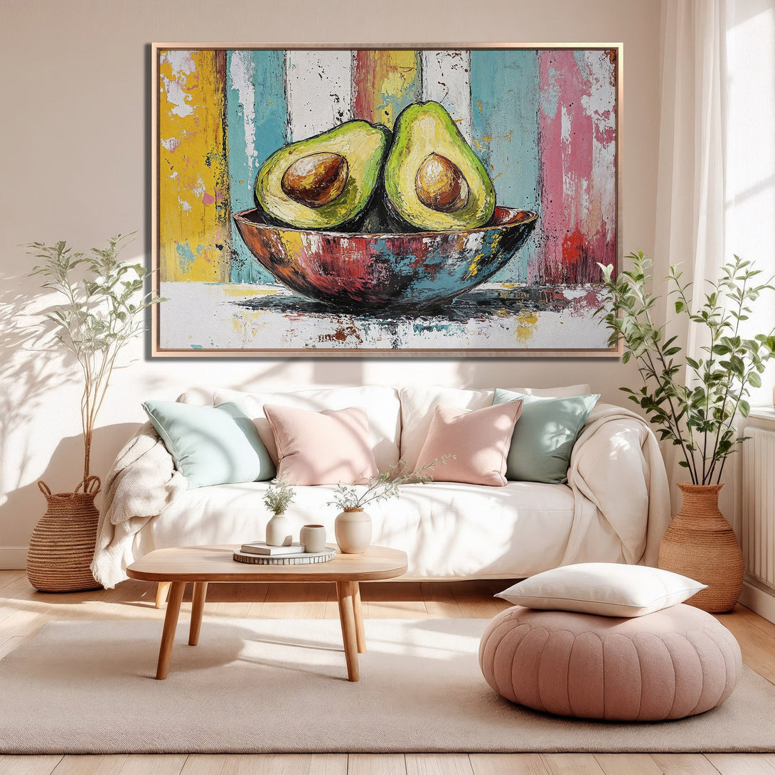 Framed Wall Art: Colorful abstract avocado painting in a modern living room. Vibrant palette of yellow, blue, pink, and green. Perfect for kitchen decor.