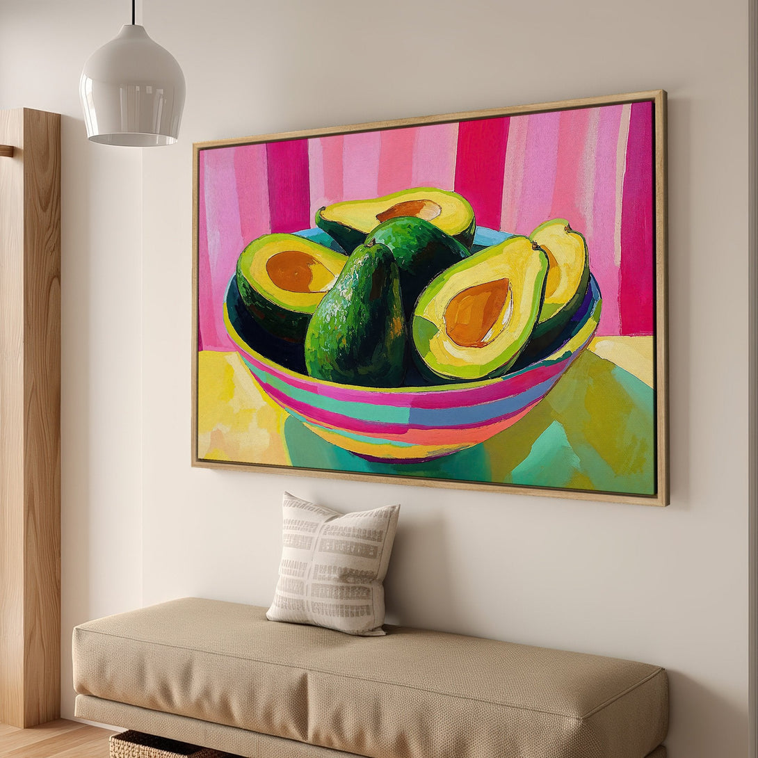Framed Wall Art: Vibrant avocado still life in a modern, colorful style. Features a bright pink, green, and yellow palette, perfect for kitchen decor.