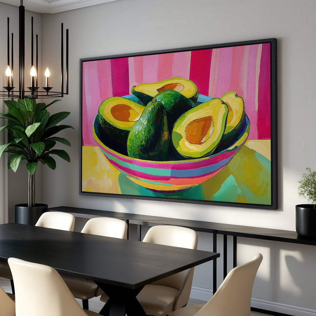 Framed Wall Art: Vibrant avocado still life painting in a modern style. Features a colorful palette of pink, green, and yellow, perfect for kitchen decor.