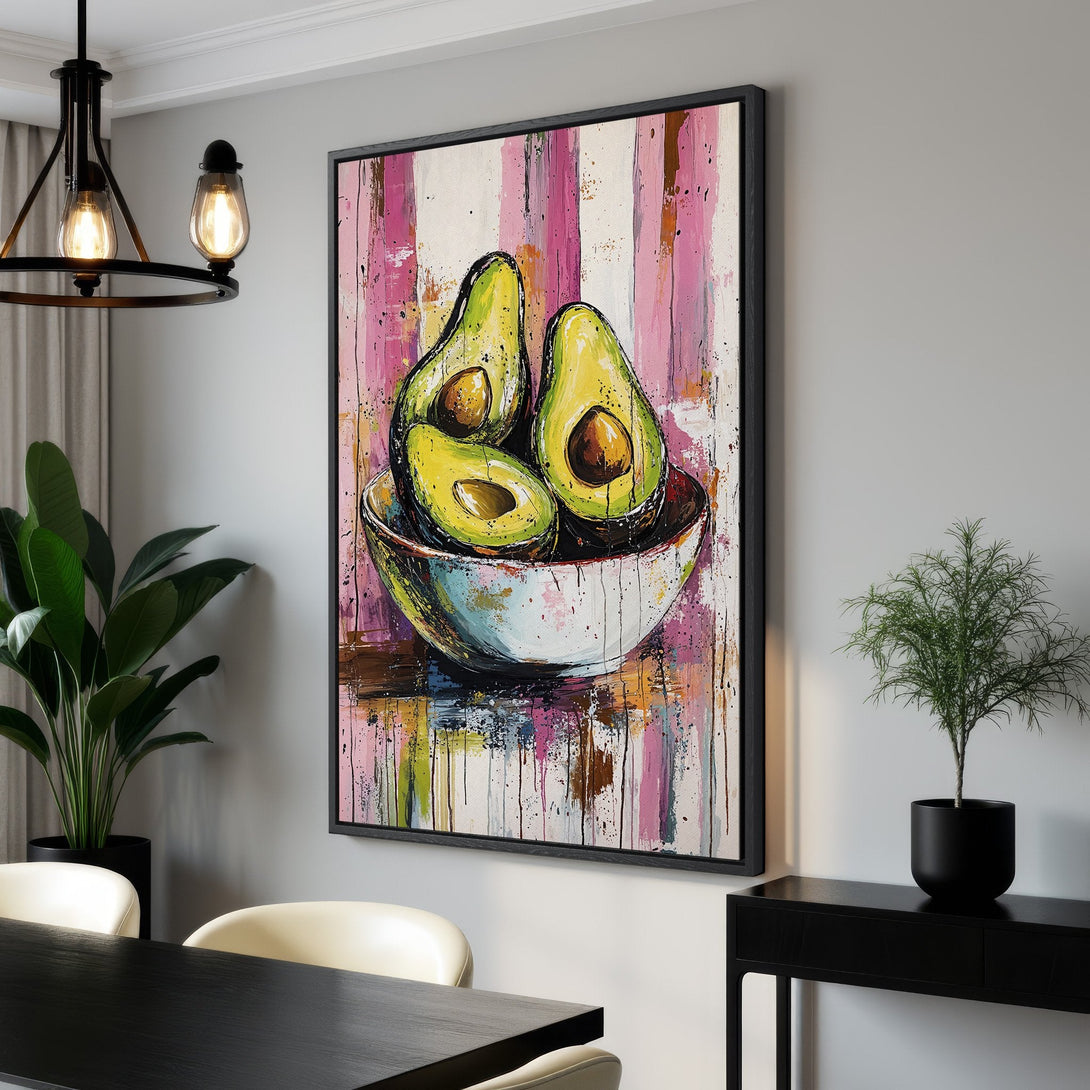 Framed Wall Art: Abstract avocado painting in a modern interior. Features a vibrant pink, green, and yellow color palette. Perfect kitchen decor!