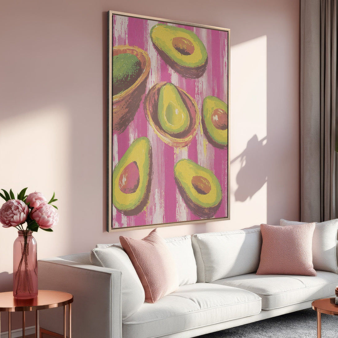 Framed Wall Art featuring a vibrant avocado painting in a modern, colorful style. Pink and green palette adds a pop of fun to any space.