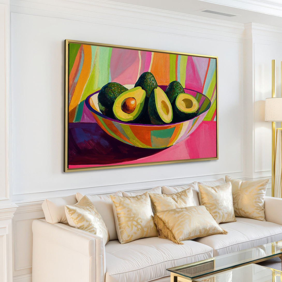 Canvas Print of vibrant avocado still life painting. Colorful abstract style with pink, green, and yellow hues. Perfect for kitchen or dining room decor.