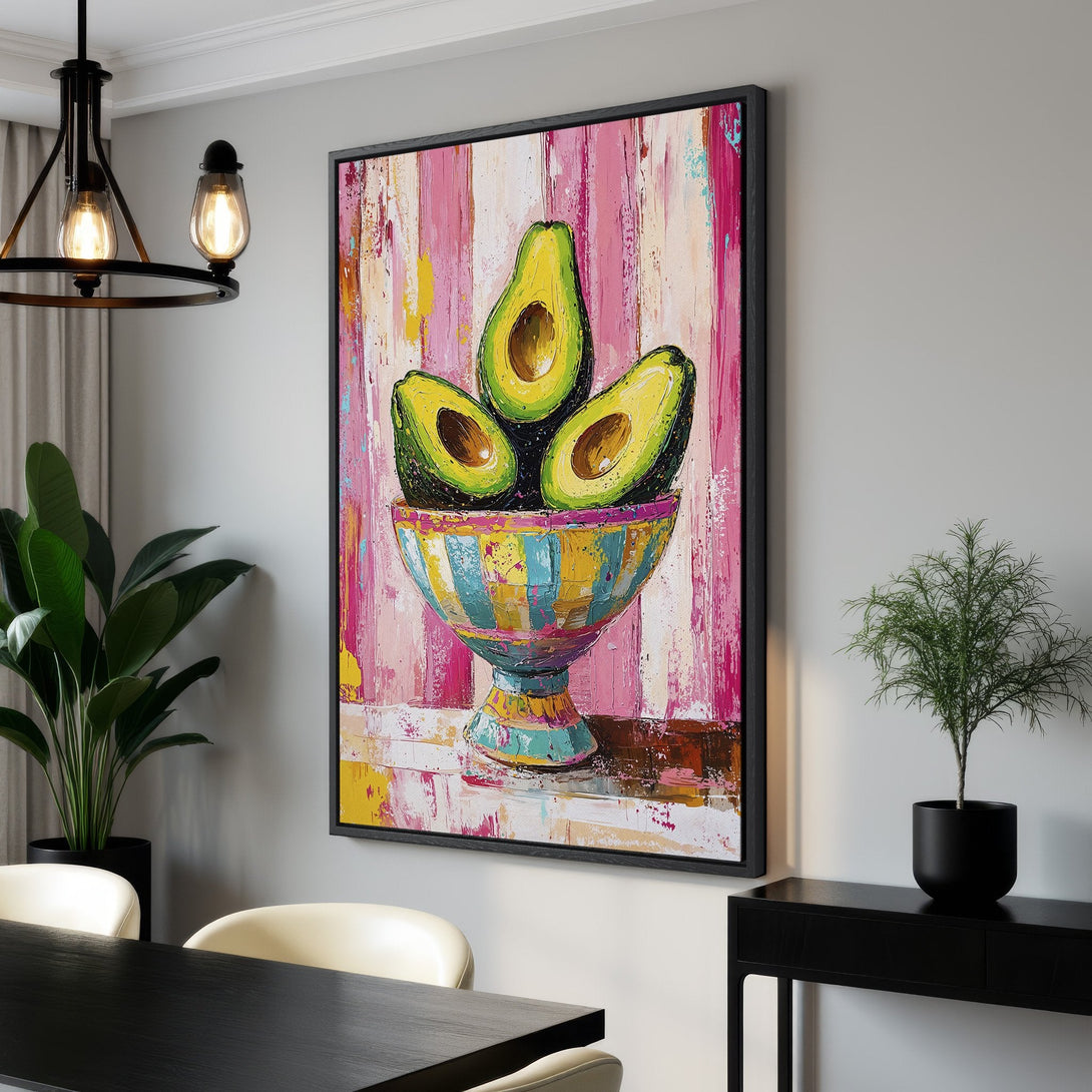 Framed Wall Art: Vibrant abstract painting of avocados in a bowl. Bold brushstrokes, pink, yellow, and green color palette. Modern art for kitchen or dining room.
