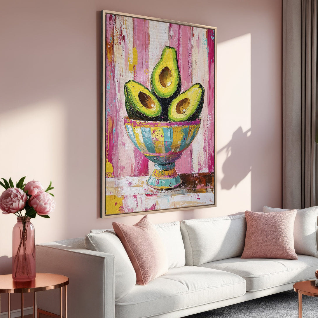 Framed Wall Art: Vibrant avocado painting in a colorful, abstract style. Pink, yellow, and green palette adds a pop of art to any interior space.