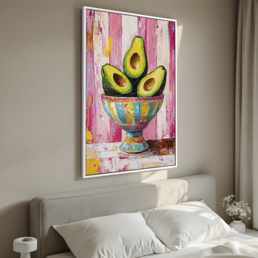 Framed Wall Art: Vibrant avocado painting in a colorful, abstract style. Pink, yellow, and turquoise palette. Perfect for kitchen or dining room decor.