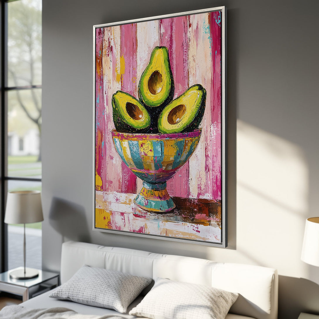 Framed Wall Art: Vibrant avocado still life painting in a modern style with a pink, yellow, and green color palette. Perfect for kitchen or dining room decor.