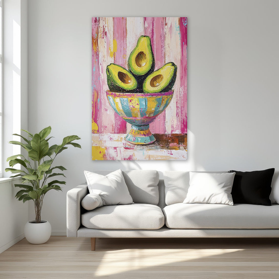 Framed Wall Art: Vibrant avocado painting in a modern, abstract style. Pink, green, and yellow color palette. Perfect for kitchen or dining room decor.