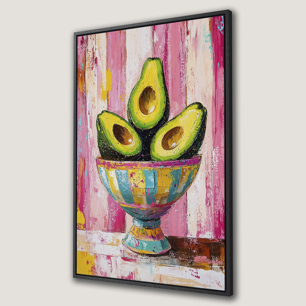 Framed Wall Art: Vibrant avocado still life painting with a colorful, abstract style. Pink, yellow, and green hues create a modern kitchen or dining room decor.