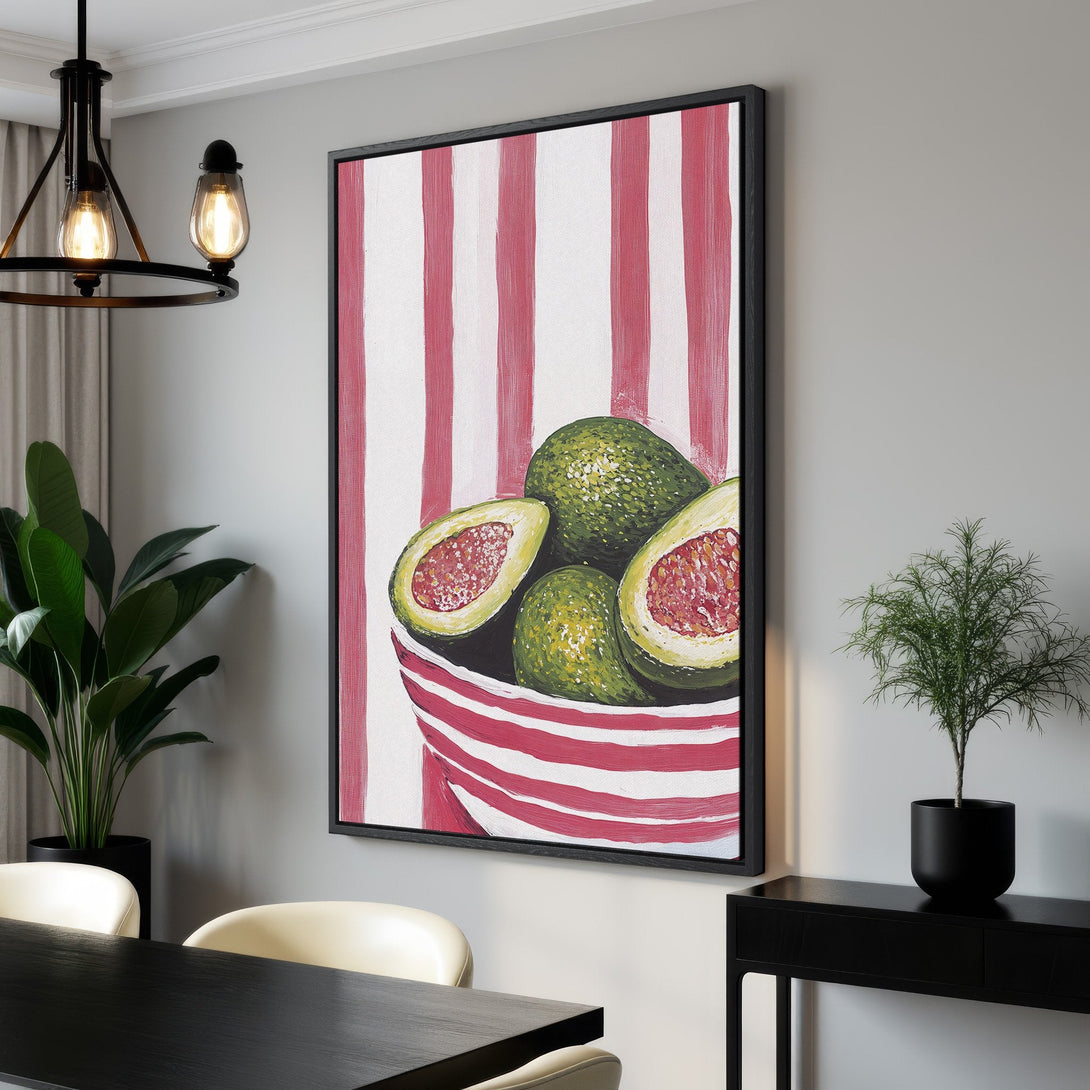 Framed Wall Art: Vibrant avocado painting with a red and white striped background. Modern style, green, red, and white color palette, perfect for kitchen or dining room decor.
