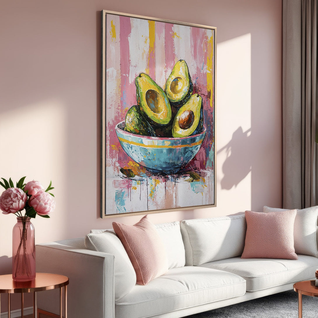 Framed Wall Art: Vibrant avocado painting in a modern style with pink, green, and yellow hues. Perfect for kitchen or dining room decor.