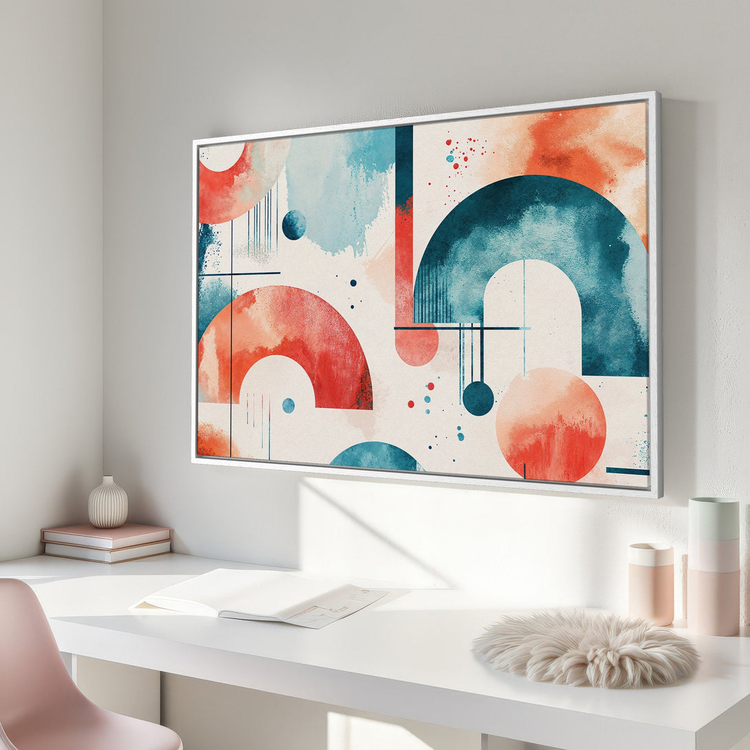 Framed Wall Art featuring an abstract watercolor design with geometric shapes in teal, orange, and cream. Modern art for home decor.
