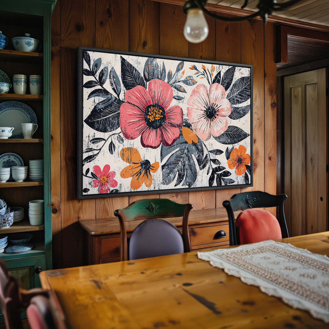 Framed Wall Art: Floral canvas print in a rustic dining room. Features pink, orange, and gray flowers with a vintage style. Perfect for adding color to your space!
