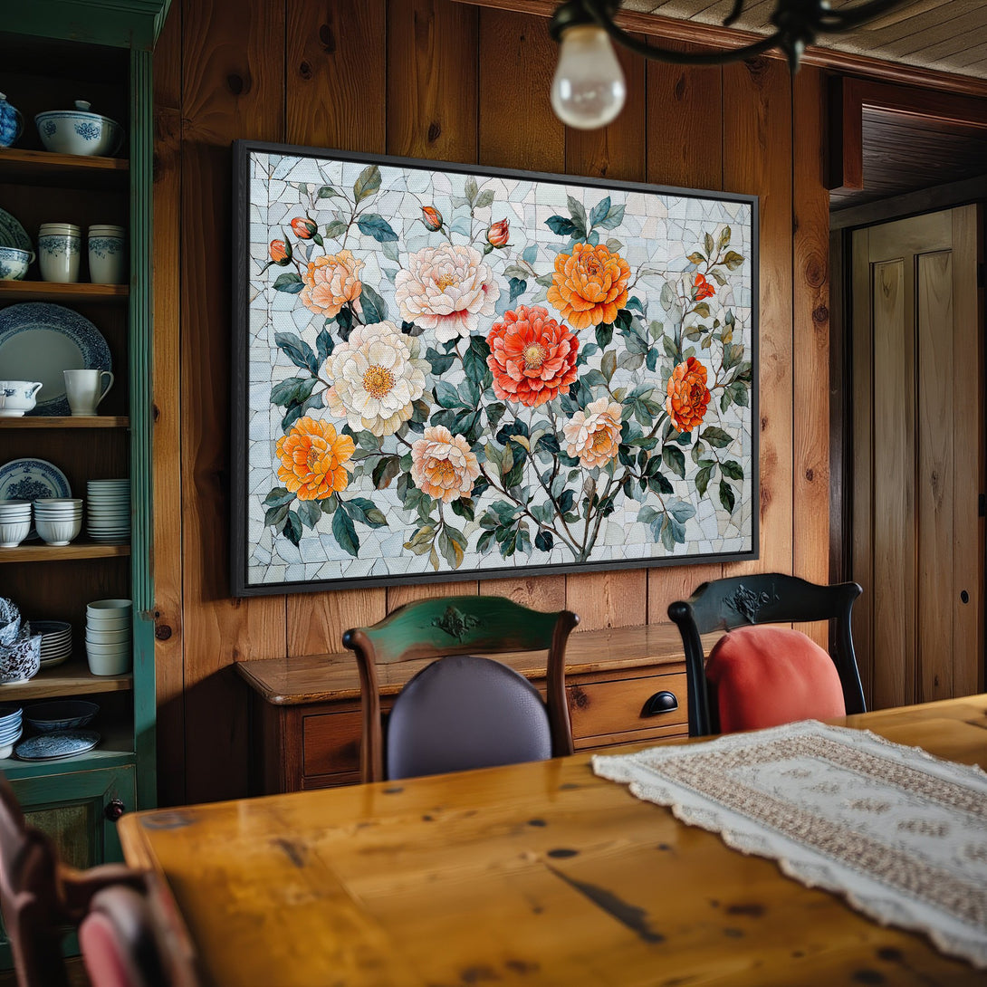 Framed Wall Art featuring vibrant floral design in orange & white. Rustic style canvas print adds warmth to a dining room interior.