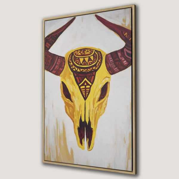 Framed Wall Art: Tribal bull skull painting in warm yellow and red tones. Add a touch of boho style with this unique canvas print!
