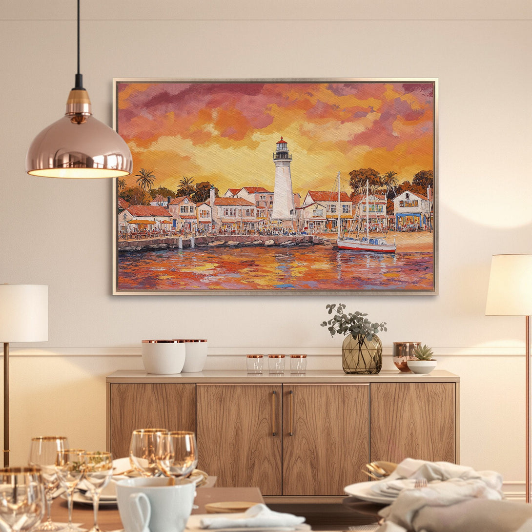 Framed Wall Art: Coastal lighthouse scene in warm orange and yellow tones. Perfect for adding a touch of art and color to your home decor.