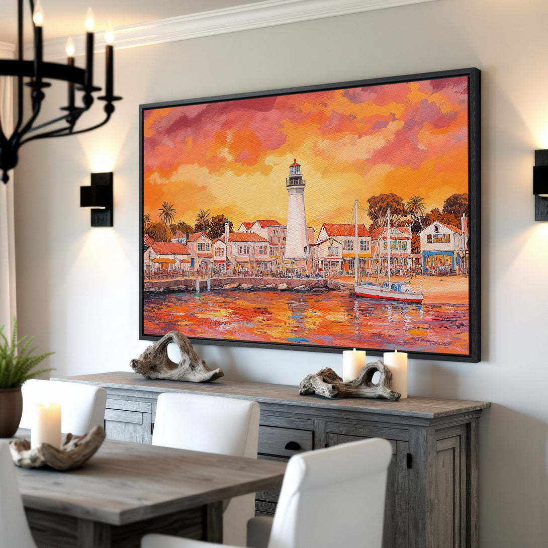 Framed Wall Art featuring a coastal scene with a lighthouse, painted in a warm orange and red palette, perfect for adding a touch of art to your home.