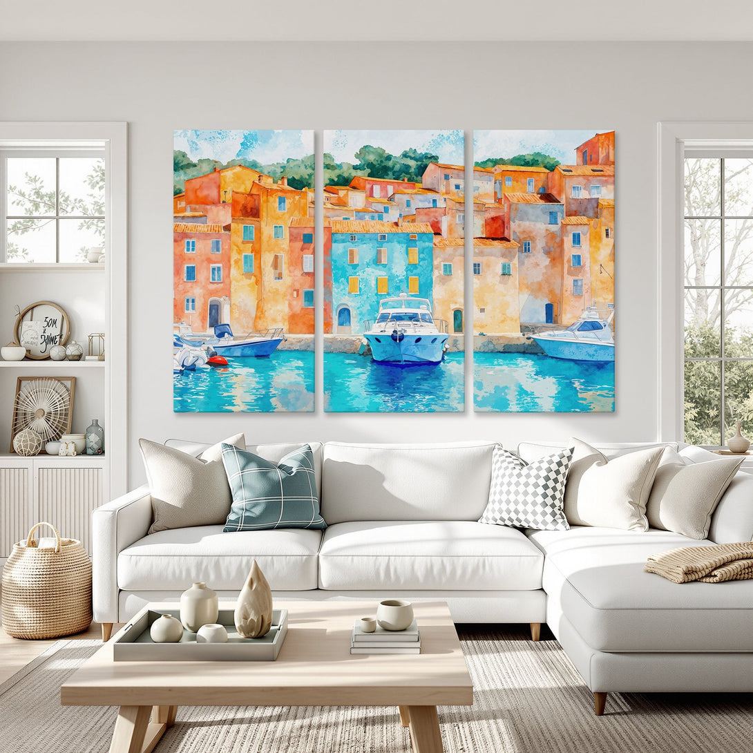 Canvas Print of a vibrant watercolor coastal scene with colorful buildings, boats, and turquoise water. Adds a pop of color to any space.