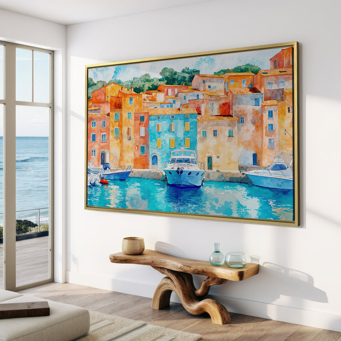 Watercolor Canvas Print of a coastal village with boats, featuring a warm color palette of orange, blue, and yellow. Perfect wall art for any space!
