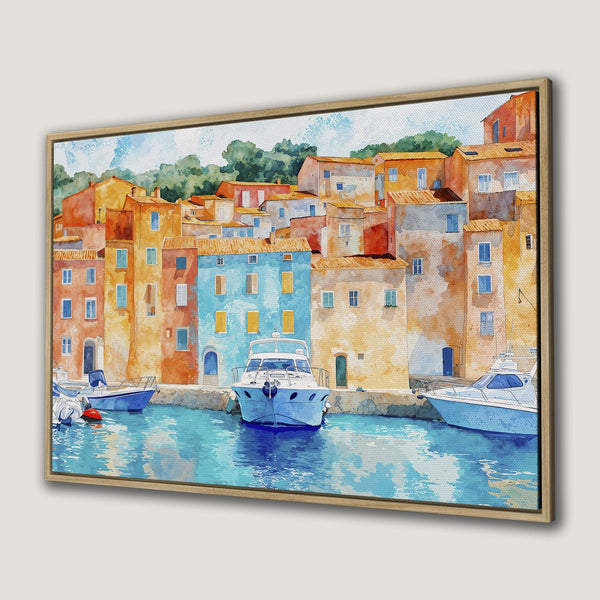 Framed Wall Art: Watercolor painting of a coastal village with boats, featuring a vibrant palette of blues, oranges, and yellows. Perfect for adding color to your space!