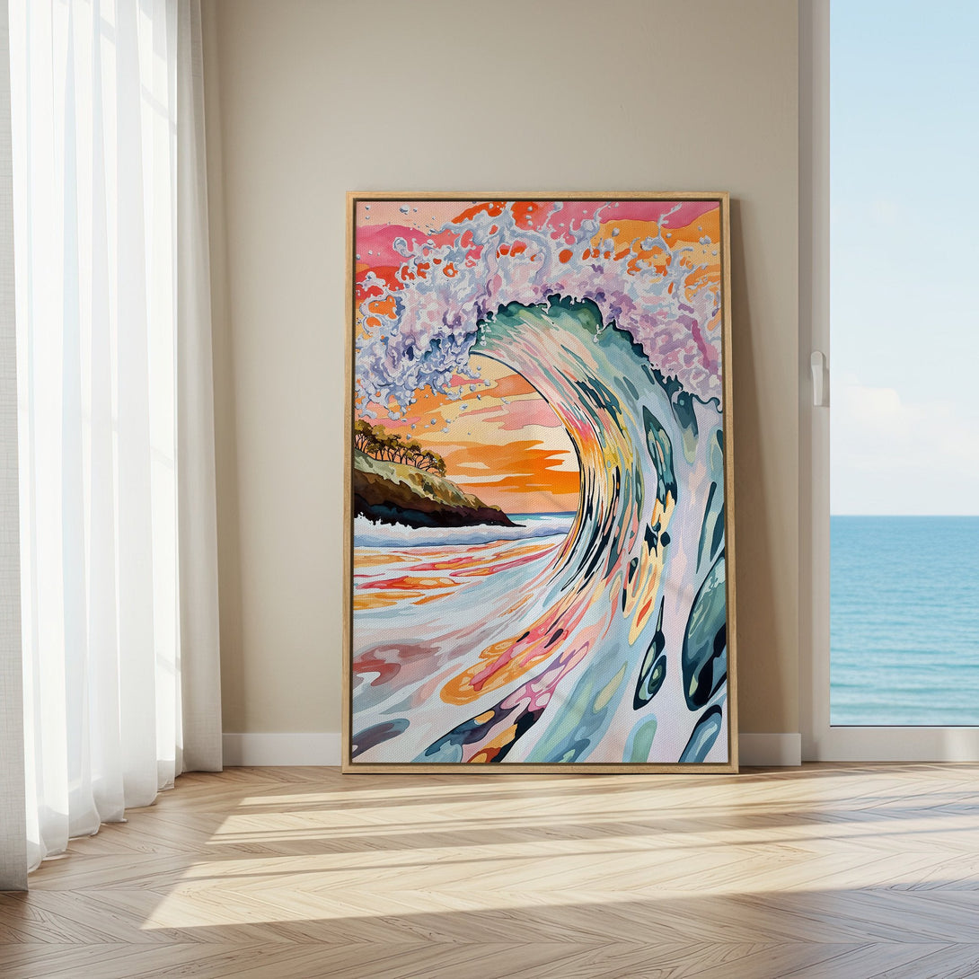 Framed Wall Art Canvas Print featuring a vibrant watercolor wave. Warm sunset colors and cool blues create a stunning coastal art piece.