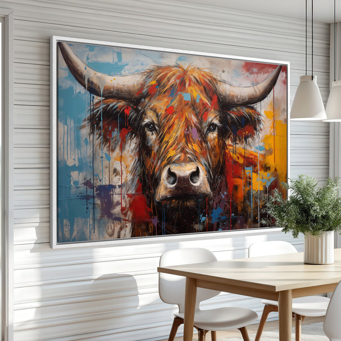 Framed Wall Art: Bold abstract bull canvas print with vibrant colors. Modern farmhouse decor featuring a striking animal portrait in a dining room setting.