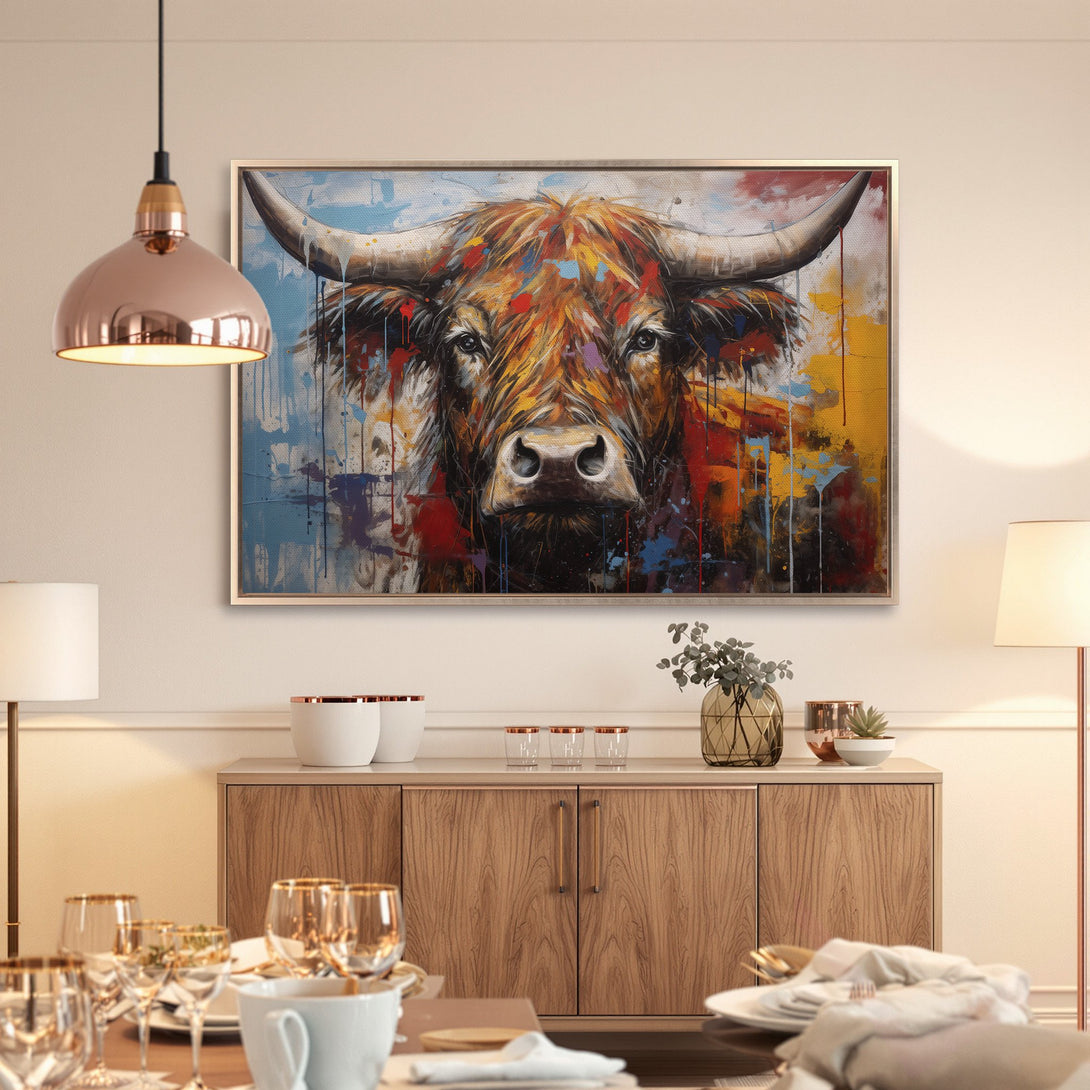 Framed Wall Art: Bold bull portrait in vibrant abstract style. Featuring a warm color palette of reds, oranges, and blues. Perfect for modern decor.