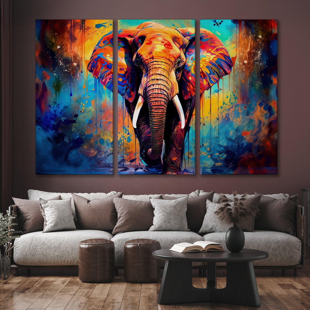 Vibrant Canvas Print of an elephant in a colorful, abstract style. Features a bold palette of blues, oranges, and yellows. Perfect wall art for any room!