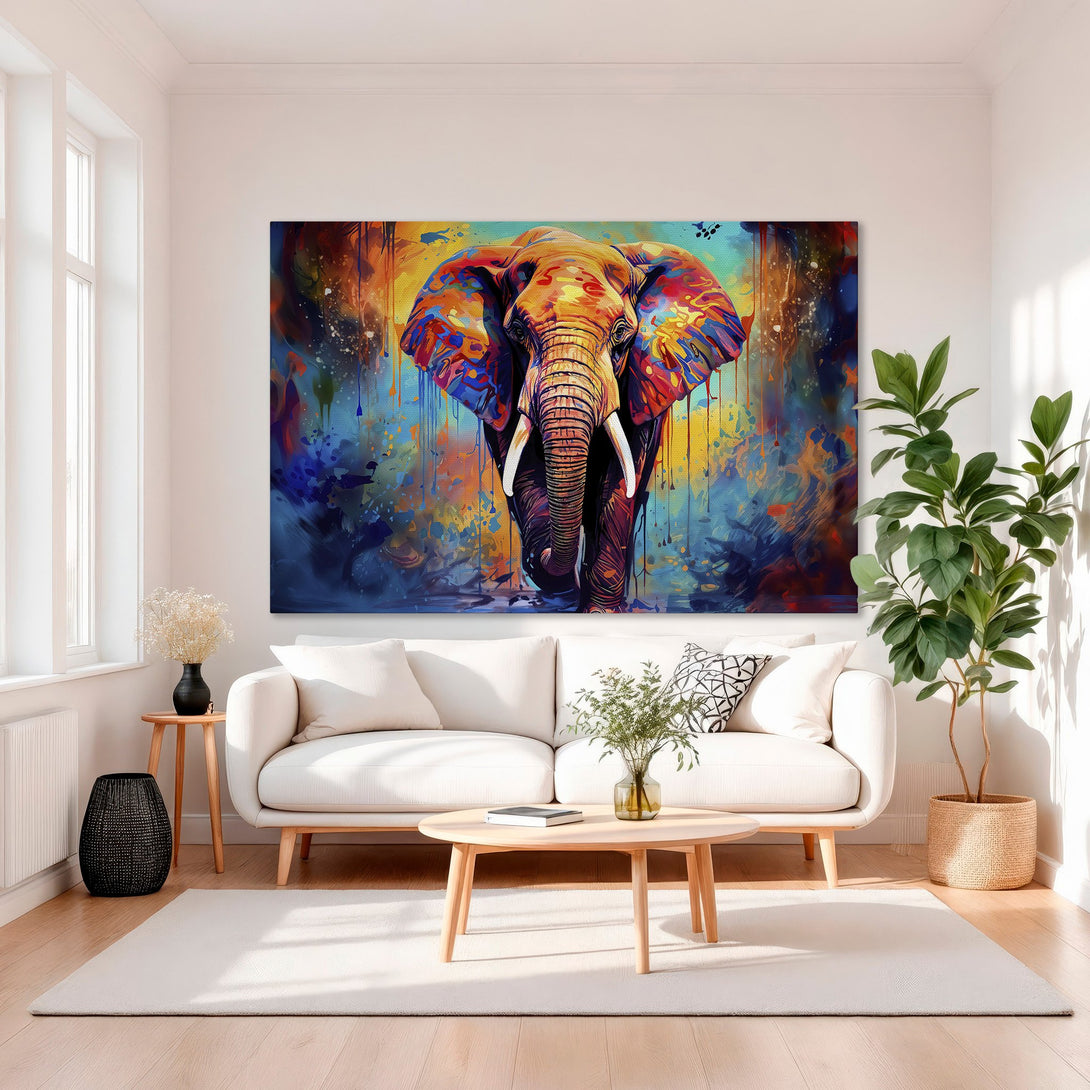 Framed Wall Art: Vibrant elephant painting in a modern, colorful style. Adds a pop of color to any space. Featuring a gold frame and a blue, orange, and yellow palette.