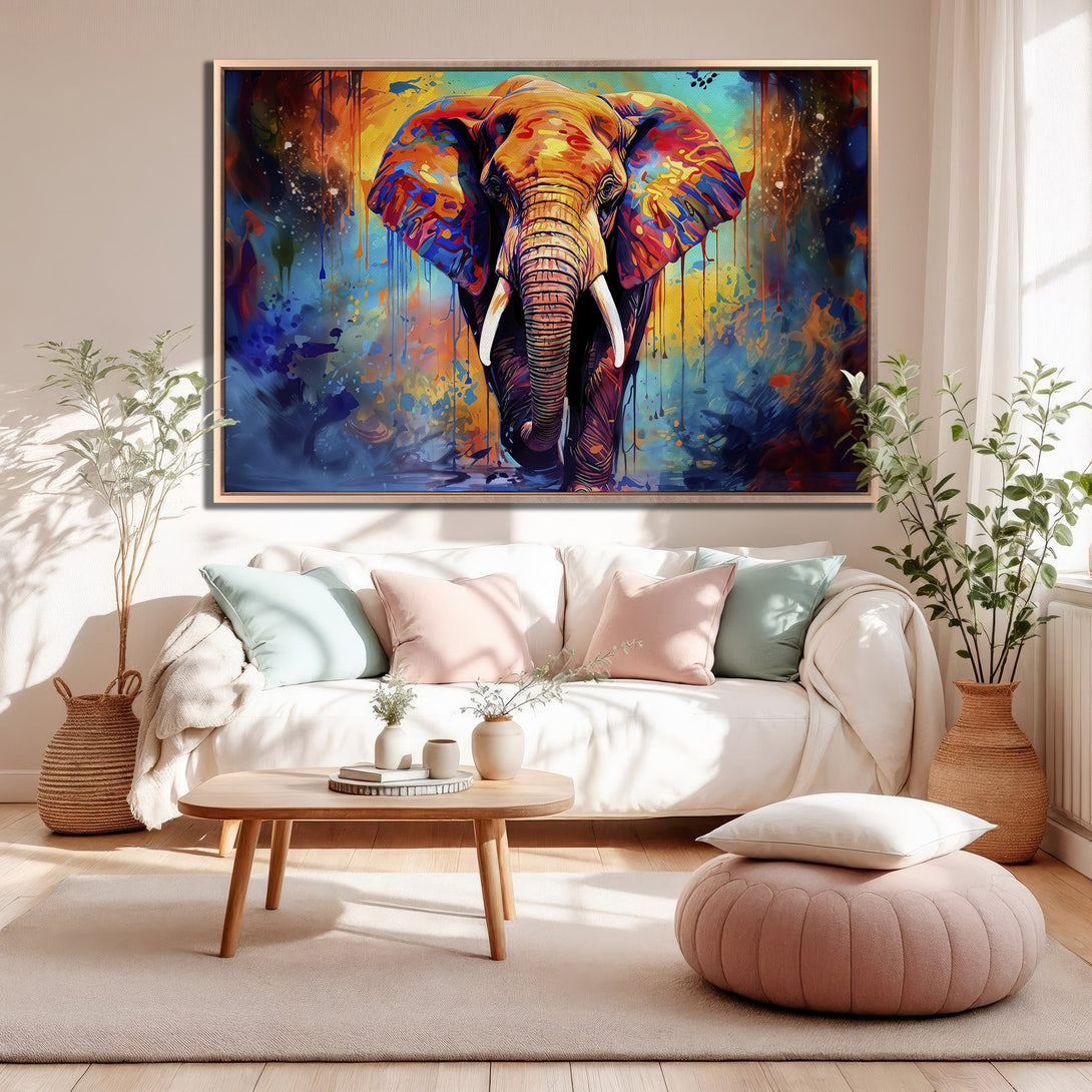 Framed Wall Art: Vibrant elephant painting in a colorful, abstract style. Featuring a warm, orange, blue, and yellow palette, perfect for modern home decor.
