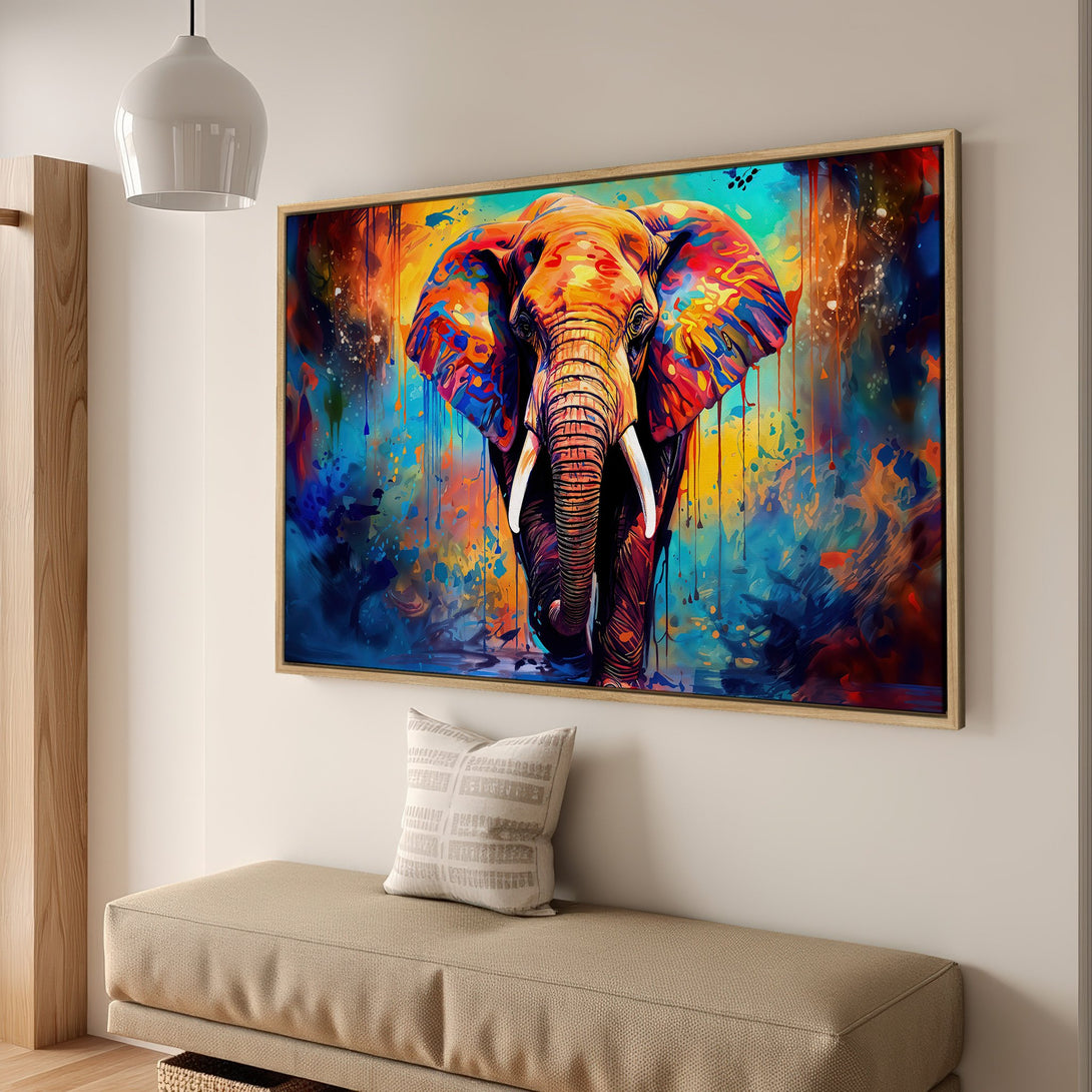 Framed Wall Art: Vibrant elephant painting in colorful, abstract style. Adds a bold statement to any room. Featuring a rich palette of blues, oranges, and yellows.