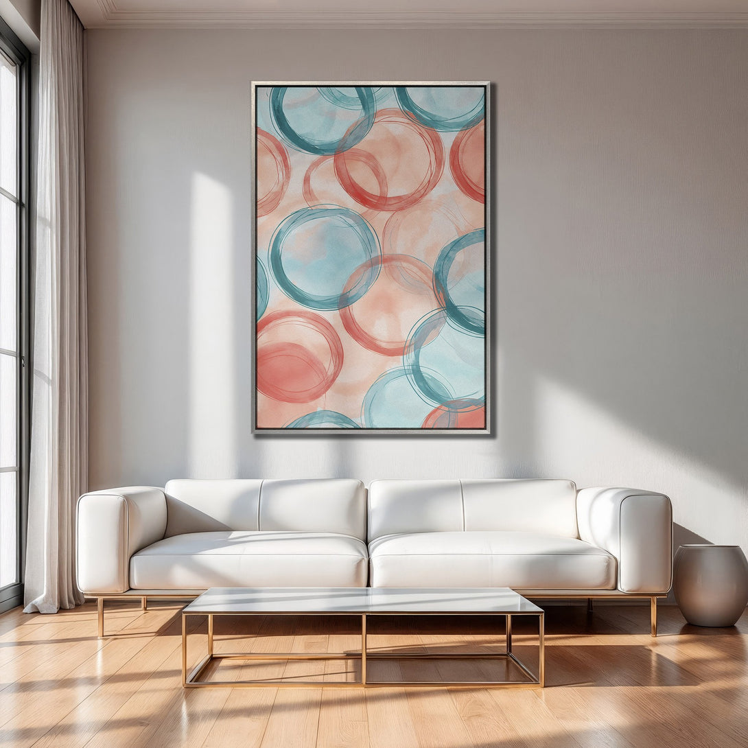 Abstract Canvas Print in a modern interior. Features watercolor circles in teal & coral. Adds a pop of color to any space.