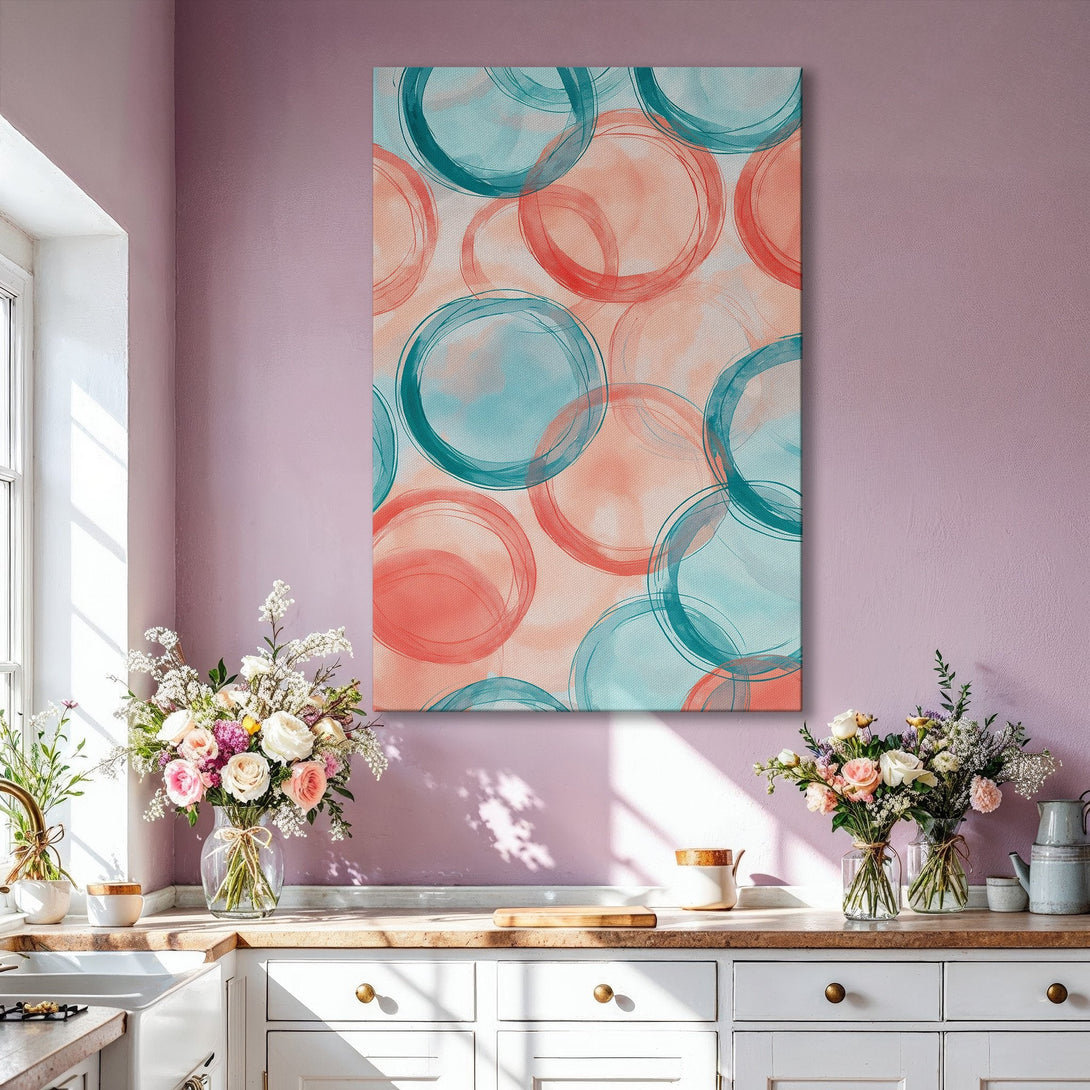 Framed Wall Art: Abstract circles in teal and coral on a blush background. Modern art canvas print adds a pop of color to any living room.