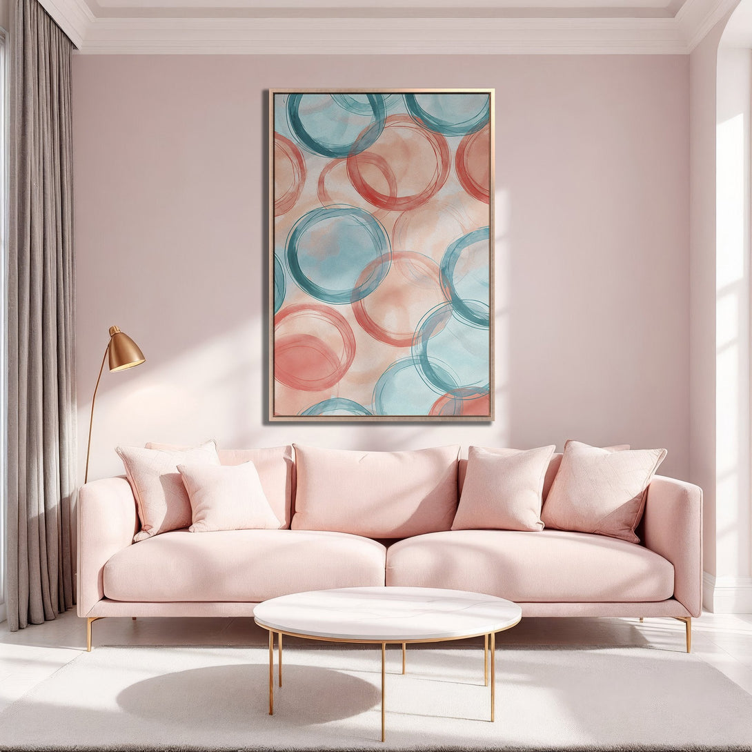 Framed Wall Art featuring abstract watercolor circles in teal and coral, perfect for adding a pop of color to any living room.
