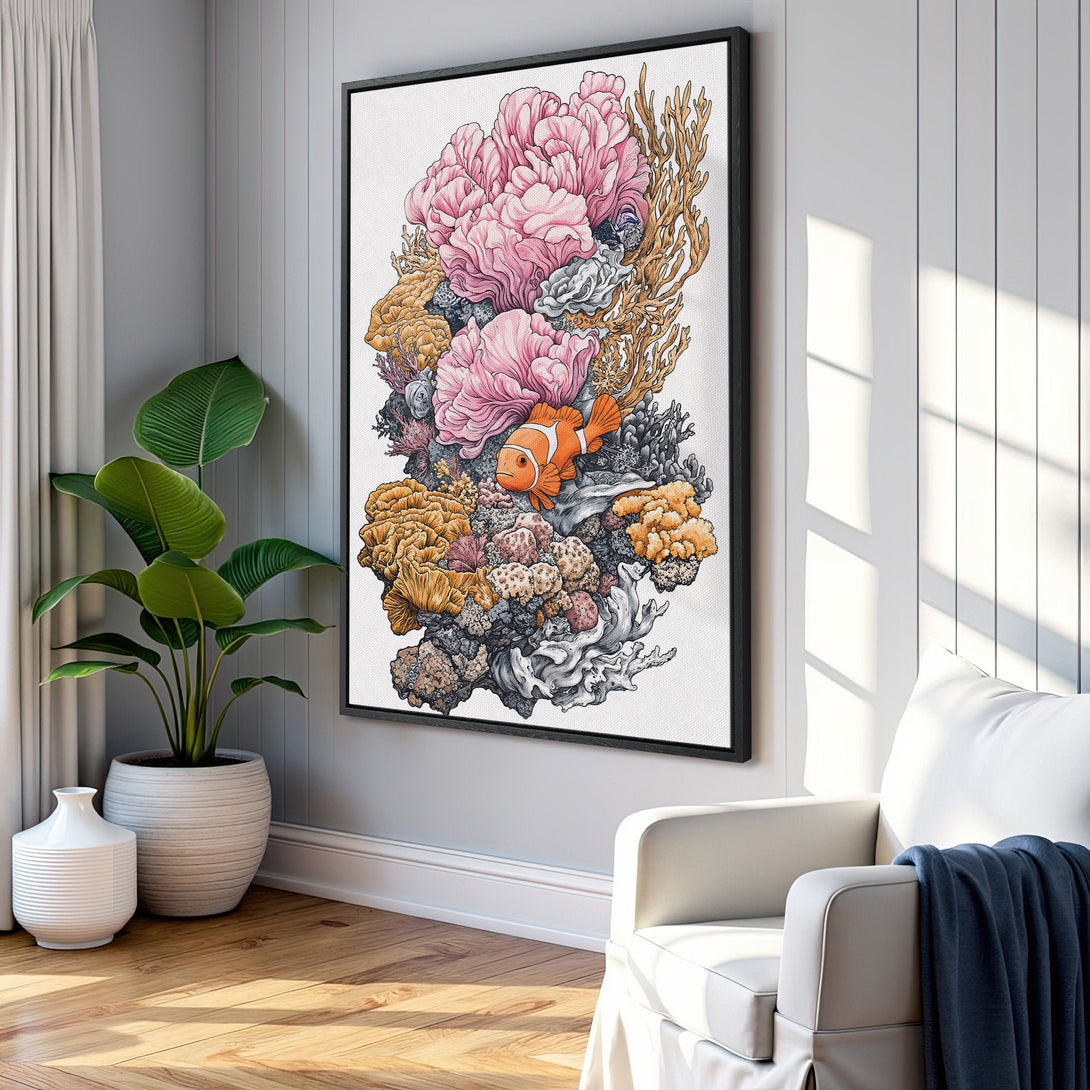Framed Wall Art featuring a vibrant coral reef illustration with pink, orange, and gold hues. Coastal-inspired art for a stylish home.