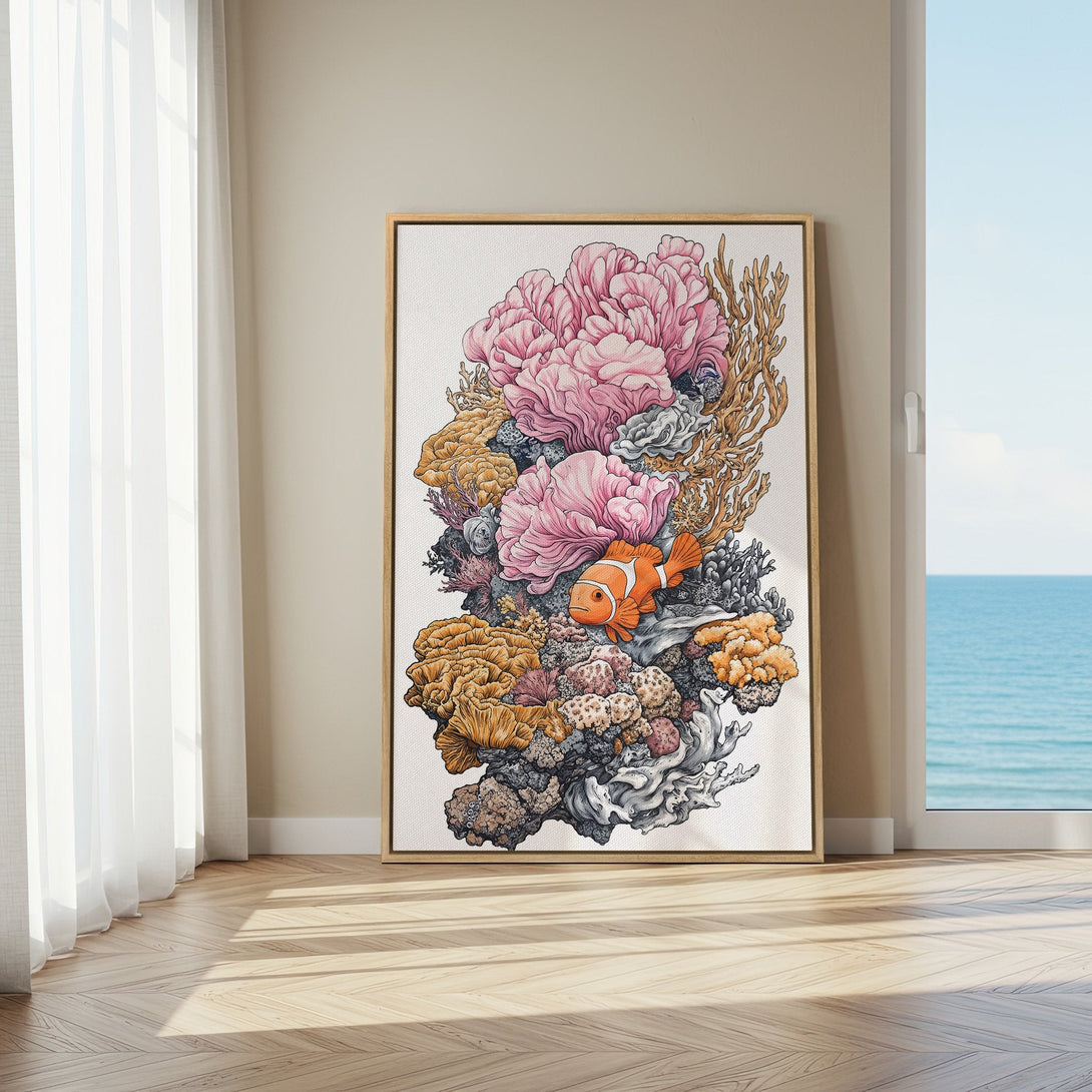 Framed Wall Art featuring a vibrant coral reef illustration with a clownfish. Coastal-inspired art in a warm, inviting color palette. Perfect for home decor.