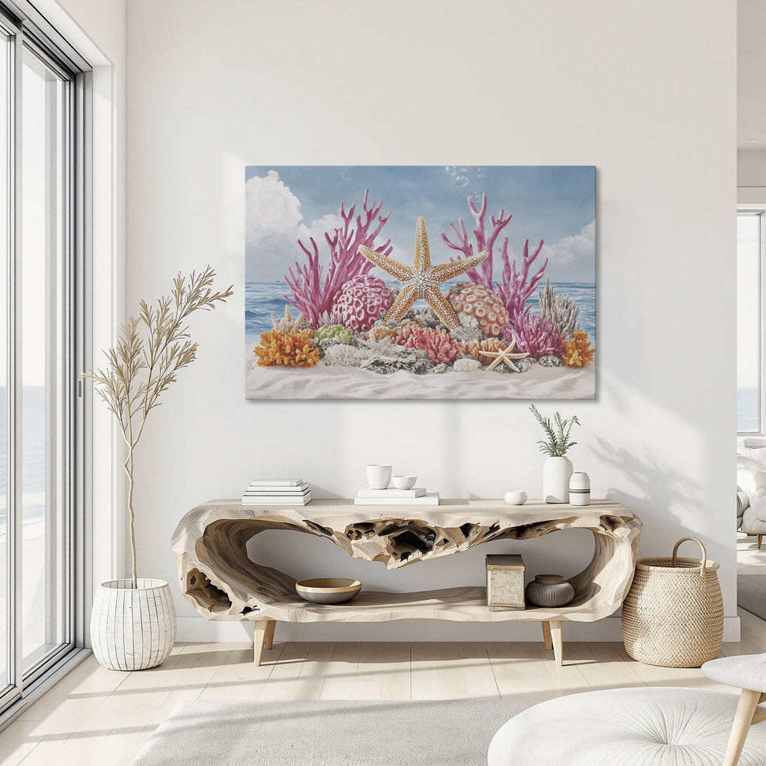 Framed Wall Art featuring a vibrant coral reef scene with starfish. Coastal decor in a soft blue, pink, and orange palette. Perfect for adding a touch of the ocean.