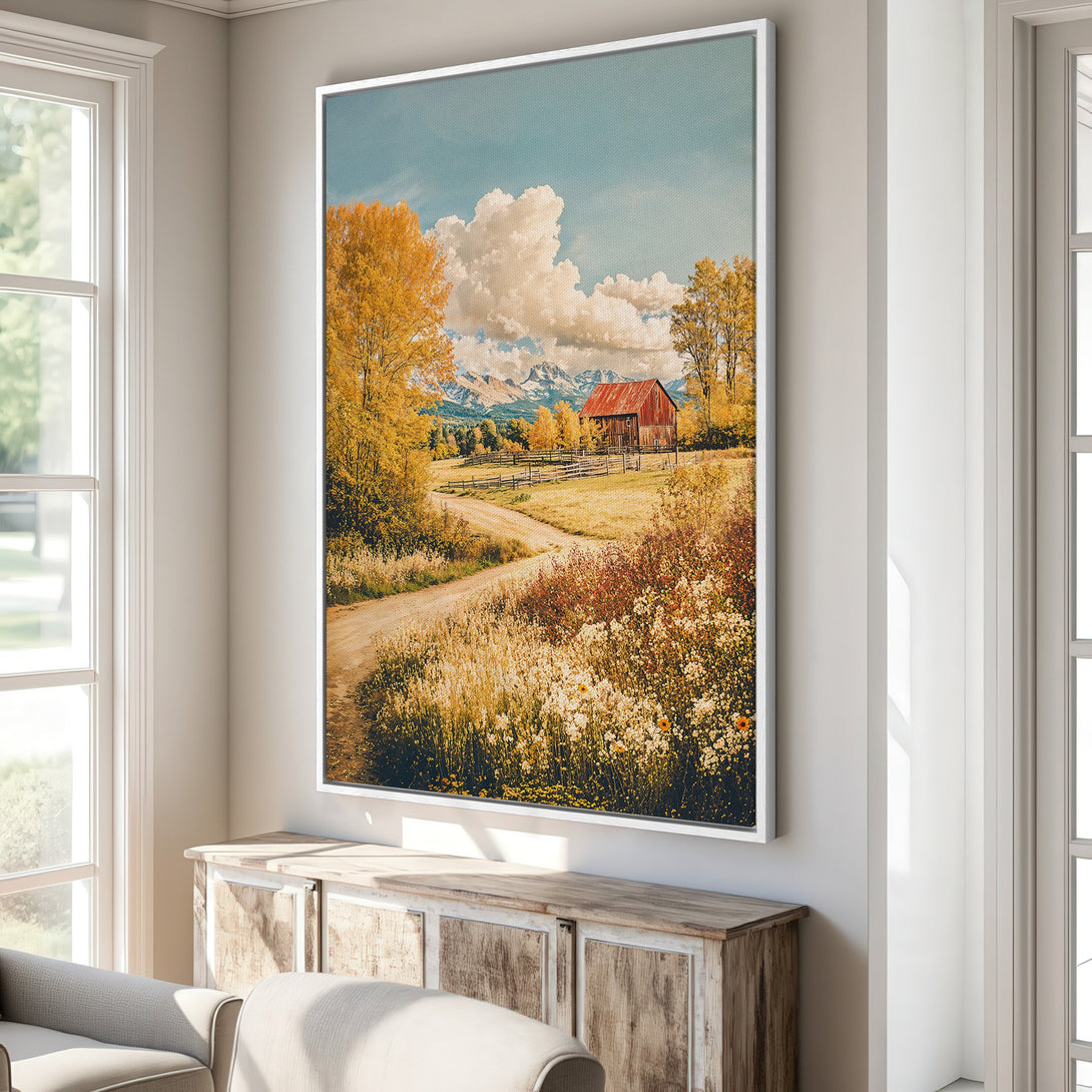 Framed Wall Art featuring a rustic landscape with a red barn, golden trees, and a dirt road. Warm, autumnal color palette. Perfect for home decor.