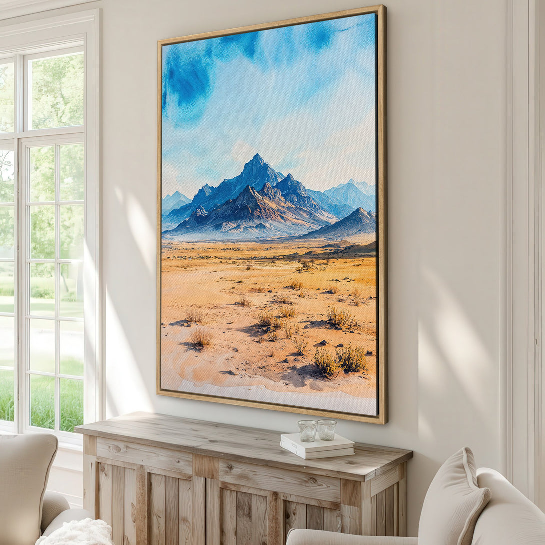 Framed Wall Art featuring a watercolor mountain landscape in blue and gold hues. Elevate your space with this stunning Canvas Print!