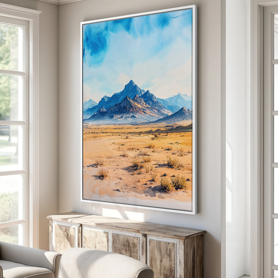 Framed Wall Art featuring a watercolor desert landscape with mountains, in a serene blue, tan, and beige palette. Perfect for adding a touch of nature to your home.