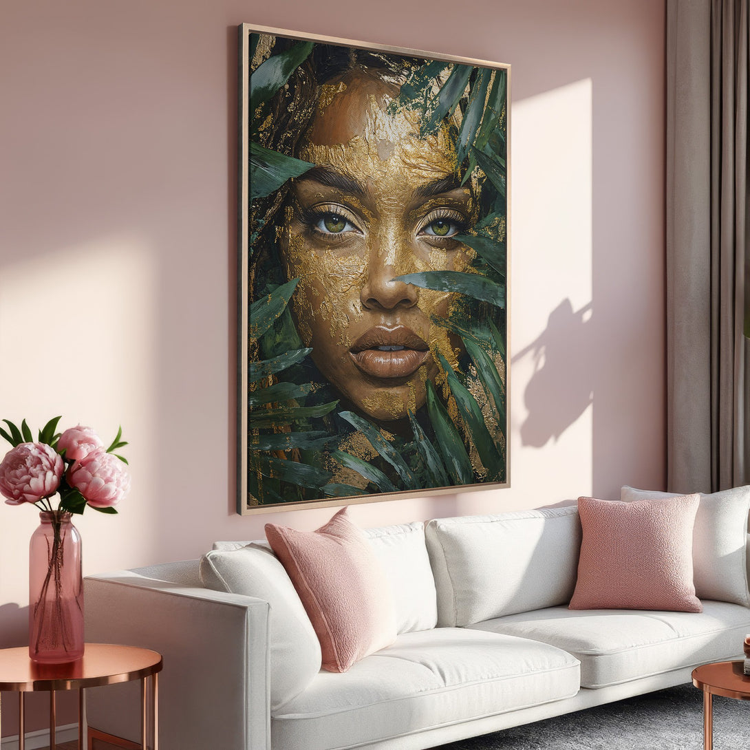 Framed Wall Art: Stunning portrait of a woman with gold accents and green eyes, surrounded by foliage. Earthy tones with a touch of pink for a chic interior.