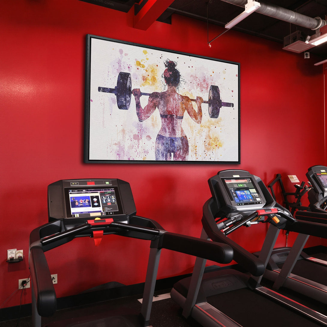 Framed Wall Art: Watercolor of a woman lifting weights in a gym. Vibrant, colorful artwork with red, purple, and yellow tones. Perfect for fitness enthusiasts.