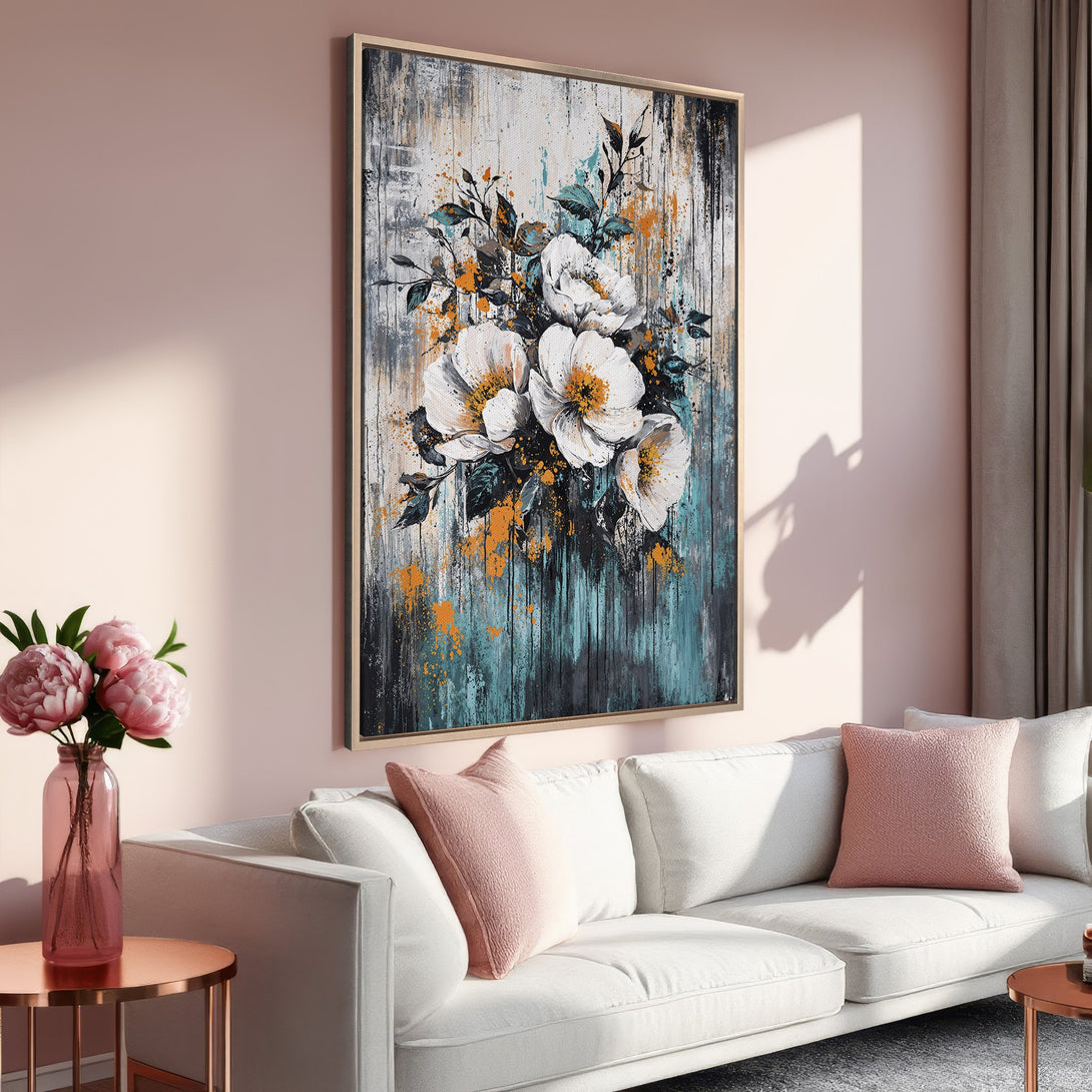 Framed Wall Art: Abstract floral canvas print in a modern living room. Features white flowers, teal, orange, and gray tones. Perfect for home decor!