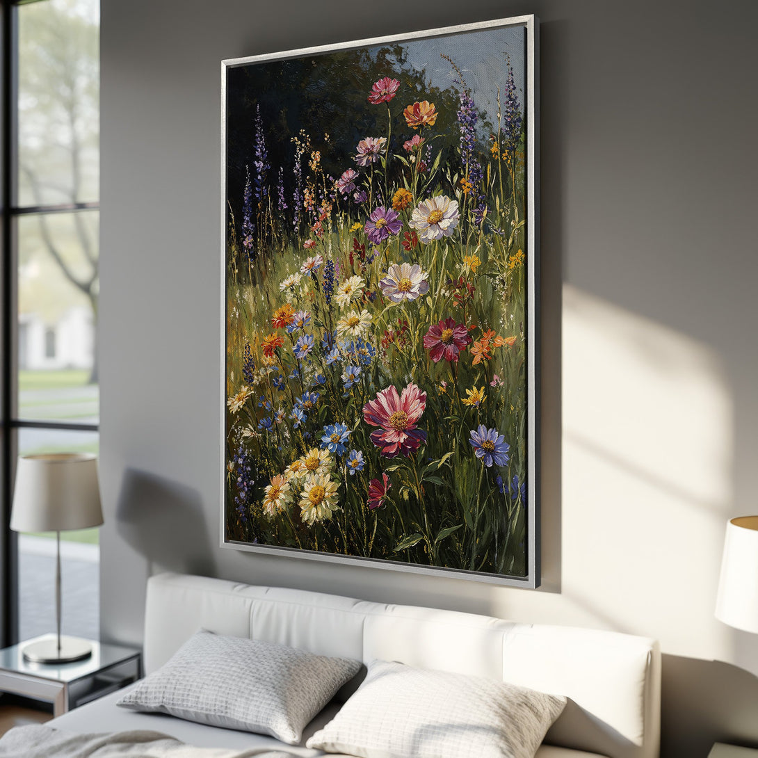 Framed Wall Art: Vibrant wildflower painting in a bedroom. Impressionistic style with a colorful palette of pinks, blues, yellows, and greens. Perfect for home decor.