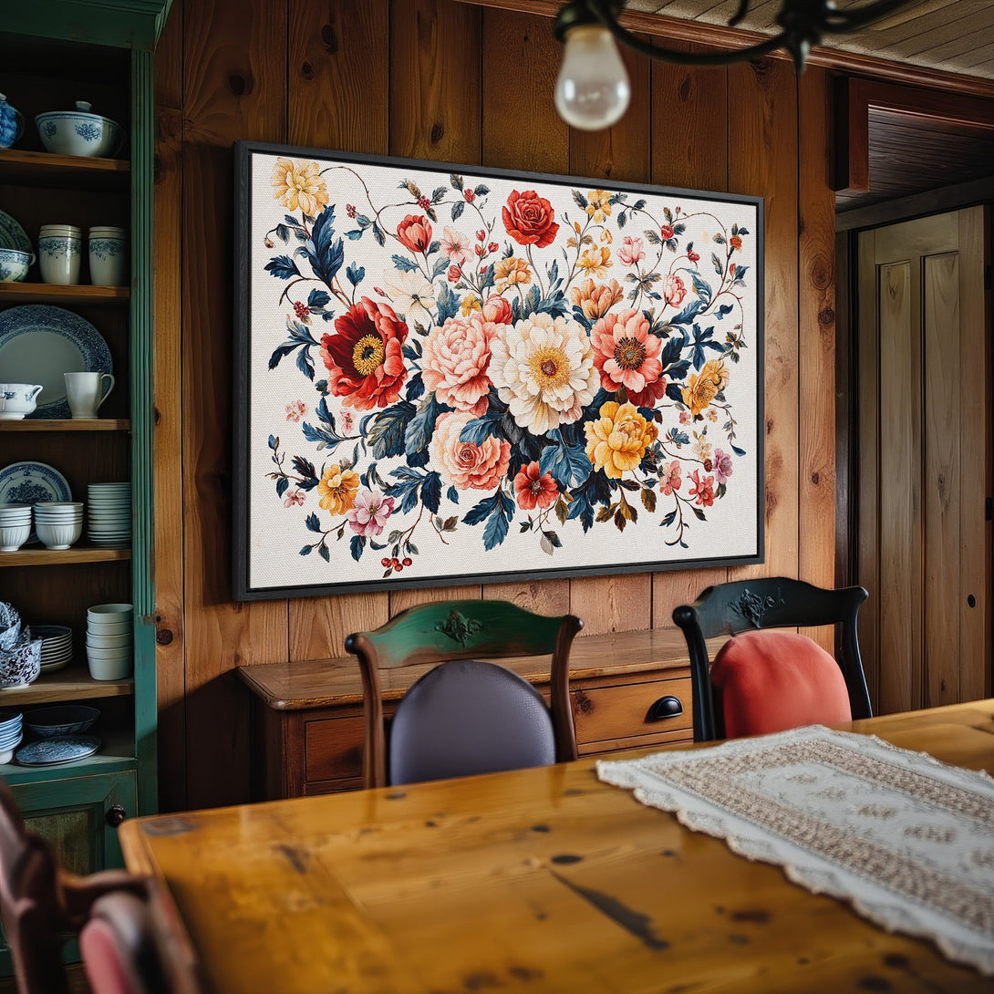Framed Wall Art: Floral Canvas Print with vibrant red, yellow, and pink blooms. Rustic style art adds charm to a cozy dining room.