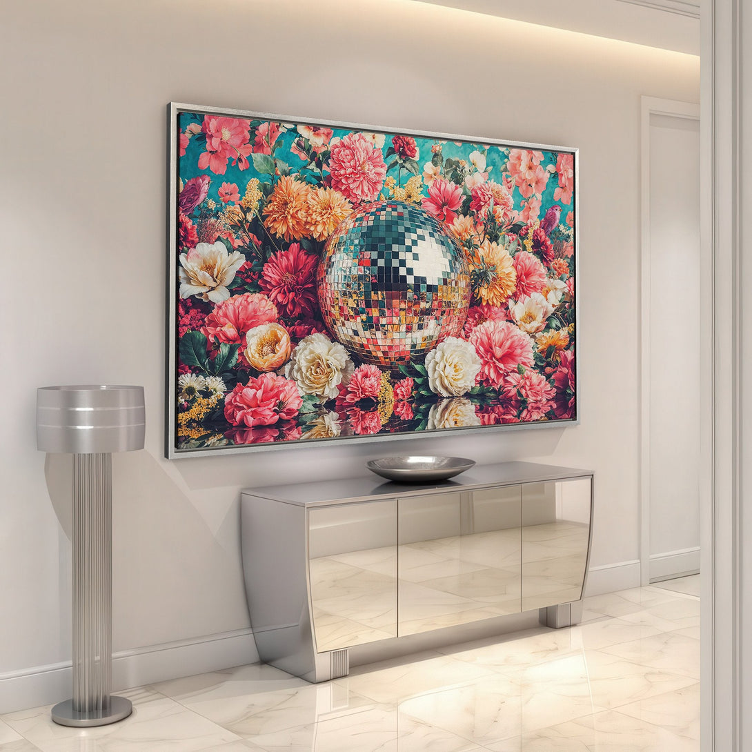 Framed Wall Art featuring a floral design with a disco ball. Vibrant pink, orange, and teal color palette, perfect for adding a pop of color to any room.